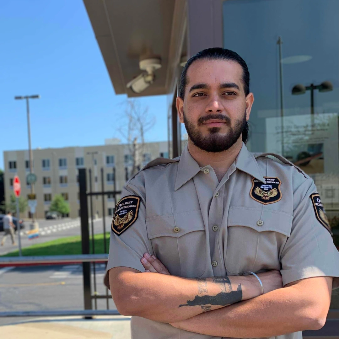 apartment security guard in Beverly Hills standing by the security booth